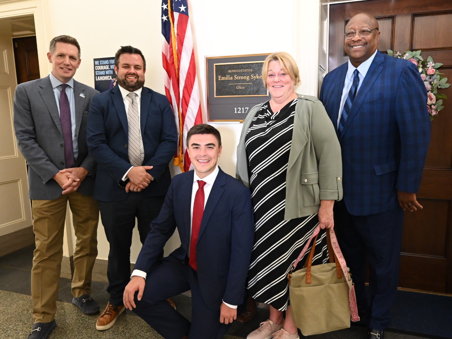 Mitch and transit leaders outside of a congressional office