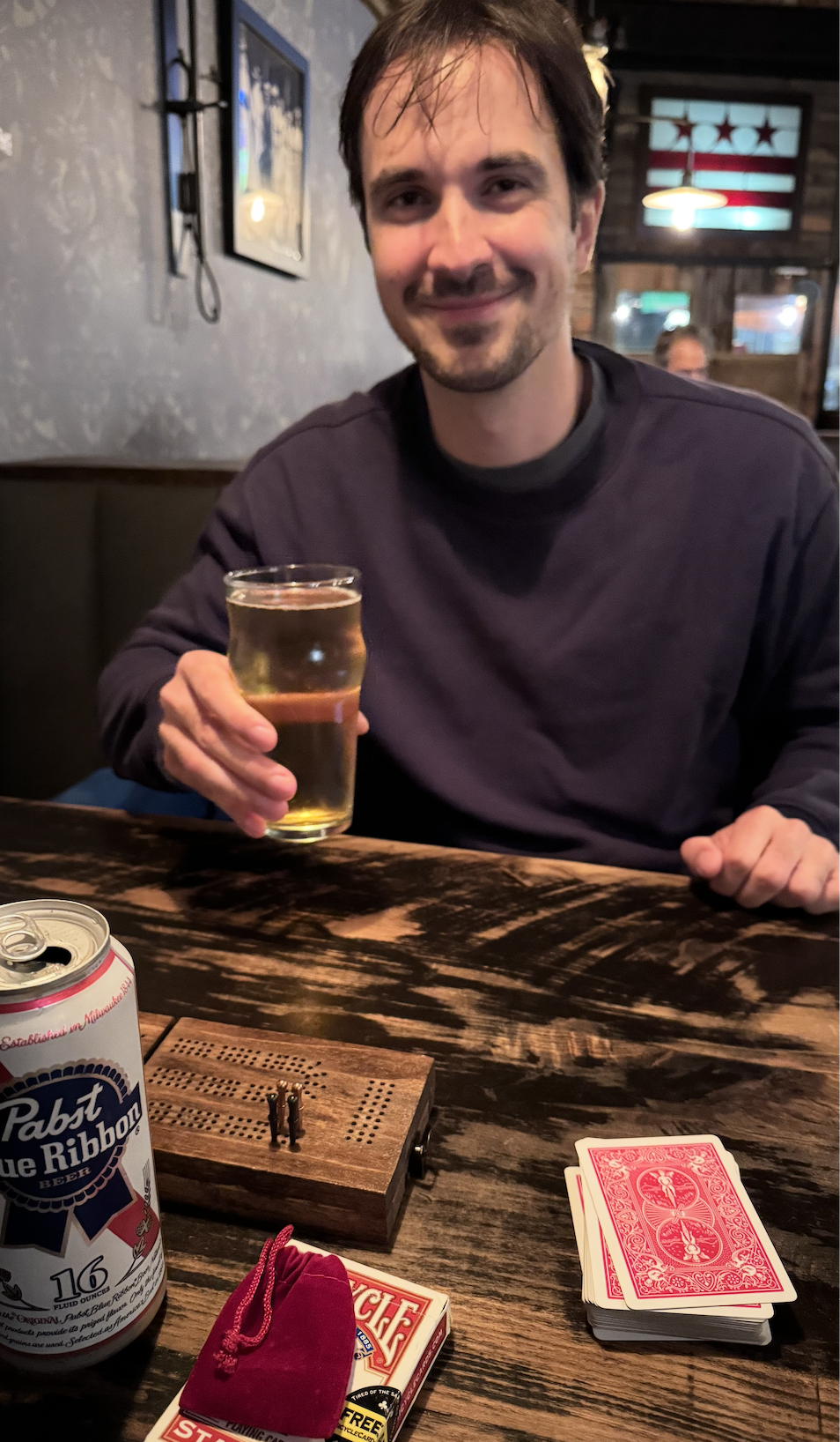 Felix playing cribbage card game