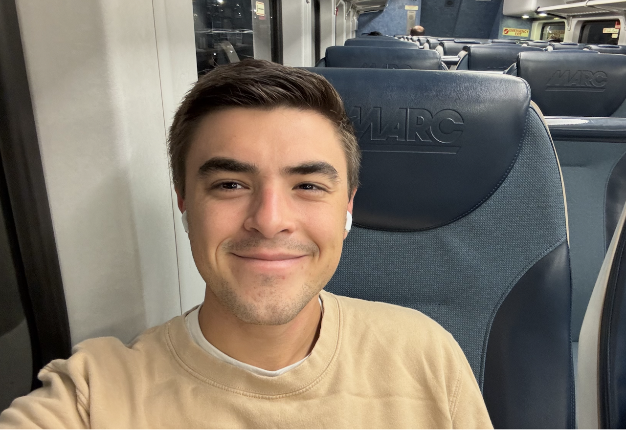 Happy mitch on train